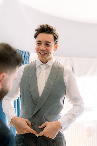 The elegance of the groom in morning suit