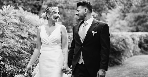 Groom with half black tight suit